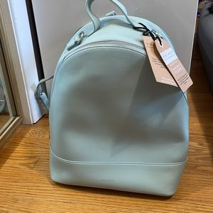 Backpack and crossbody bag. Mint large Cora Backpack from Pixie Mood.